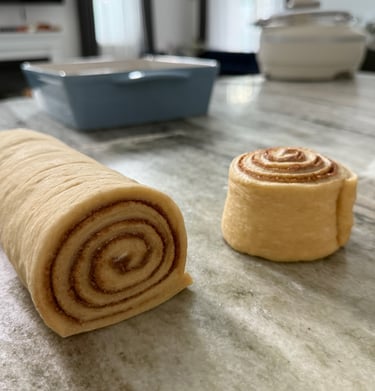 a roll of cinnamon rolls