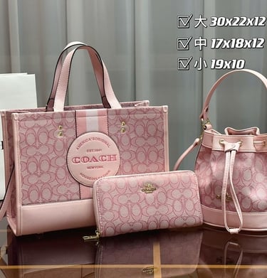 a coach handbag with a pink purse and a white purse