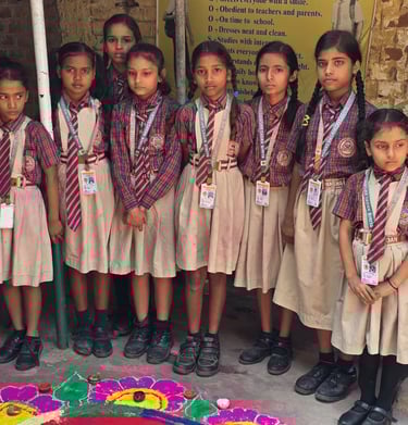 VBSS students celebrating Diwali with colorful Rangolis.