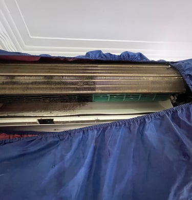 split system air conditioner indoor unit coil cleaning during maintenance service