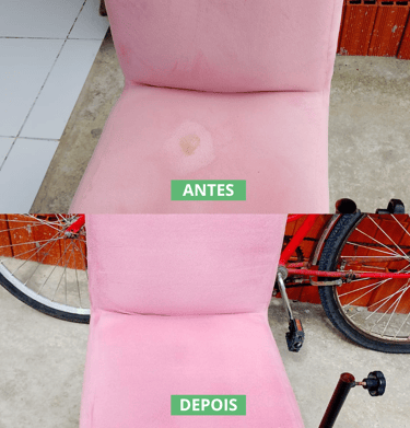 a pink chair with a bicycle in the background