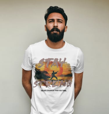 Man wearing stay strong tshirt created by young creator and neurodivergent artist