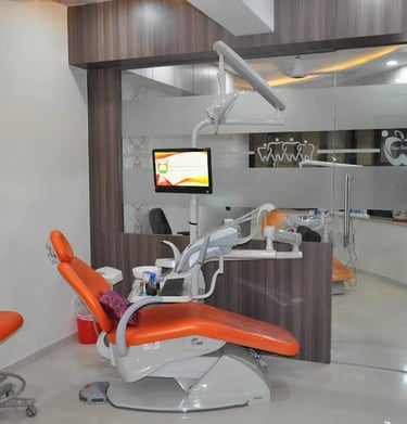 Modern dental clinic interior featuring an orange patient chair and professional equipment for oral care.