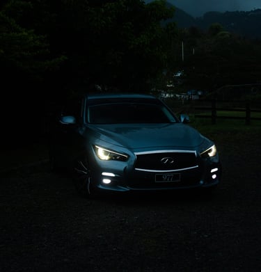 blueish-grey infinity q50 in the night
