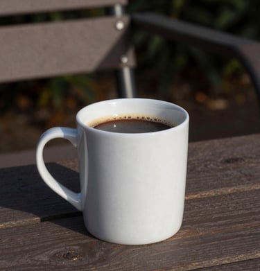 Brandon animatedly sharing a story while Ethan nods and smiles, both seated on cozy outdoor chairs.