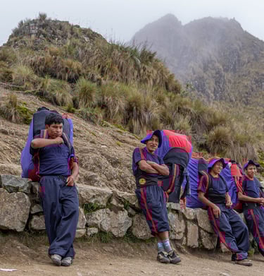Our inca trail trek porters resting on top of dead womans