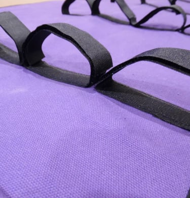 Close-up of a purple multi-loop bag