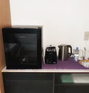 Wasserkocher, Toaster und kleine Ausstattung im Gästezimmer