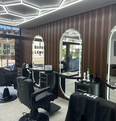 a salon with a large mirror and a mirror