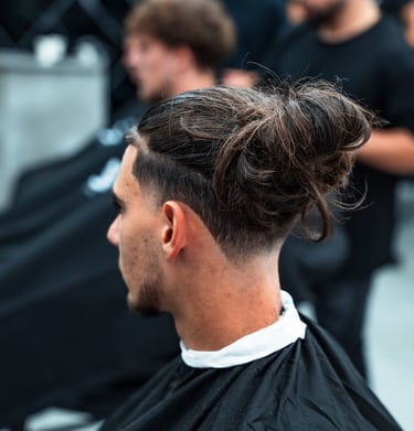 a man with a messy hairdoodle in a hairdo