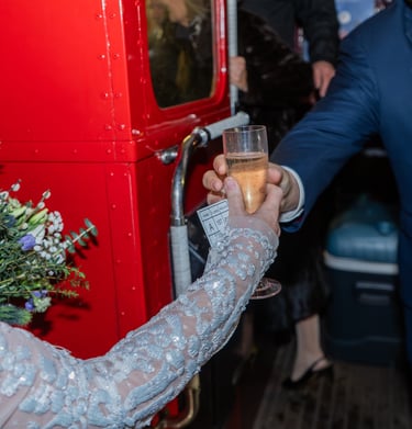 bride handed a glass of champagne 
