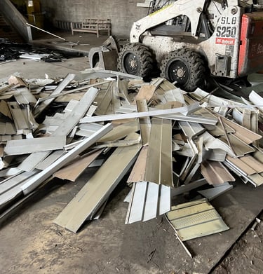 Aluminum siding being recycled