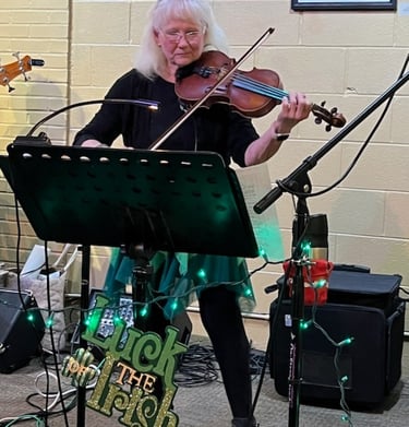 Laurie of Crossmolina Band playing violin.