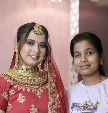 Bride with elegant red bridal makeup and traditional jewellery after professional makeover