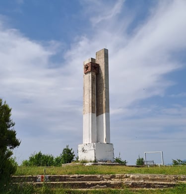a monument tower with a star on top of it