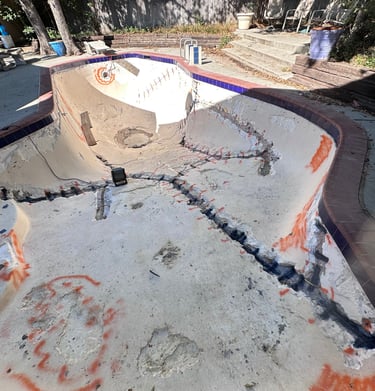 Cracks in the pool were repaired using reinforced rebar and anchoring injections
