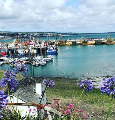 Fishing port Cornish seaside with boats on the harbour 