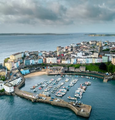 Tenby Harbour Pembrokeshire sunny cheerful with colourful boats 
