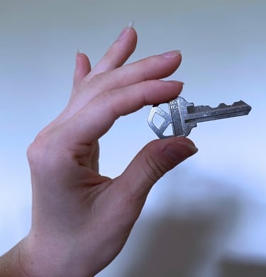  key duplication in Asheville NC with hand holding key