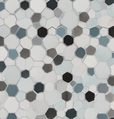 An ornate tiled floor with a hexagonal pattern, featuring intricate designs in shades of blue and beige. The central motif of each tile includes floral elements outlined in different colors.