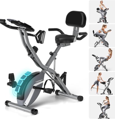 a woman is sitting on a stationary bike