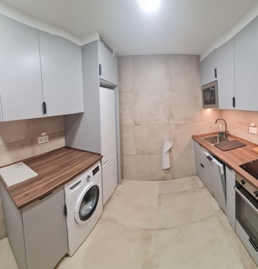 Fully equipped kitchen with washing machine and oven, Anne apartment San Sebastian