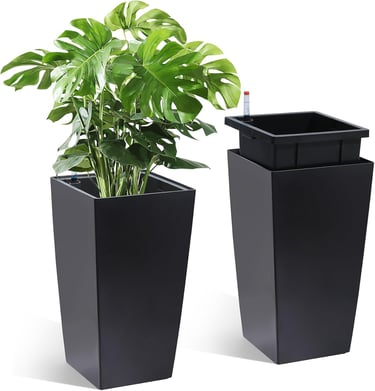 Tall black self-watering planter with a lush Monstera Deliciosa houseplant and water level indicator.