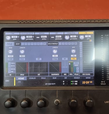 Digital audio mixing console screen showing sound levels, channel settings, and professional recording controls.