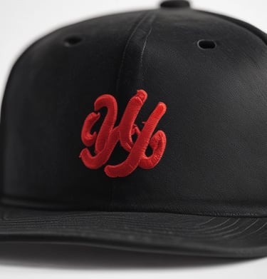 An embroidered cap featuring intricate designs.