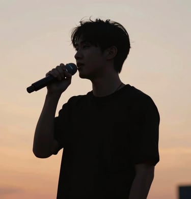 A portrait of P.E.P YLS in silhouette against a glowing #F5F5EB sunset, holding a microphone, very powerful and artistic.