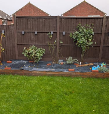 raised flower bed and fence maintenance