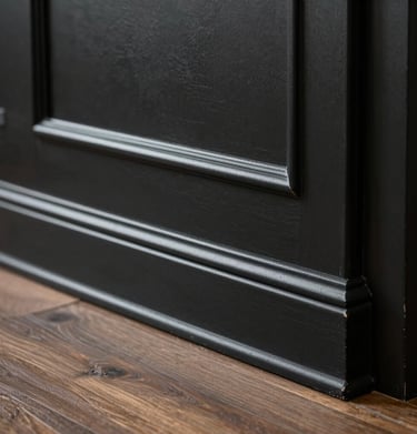 A bright, open-concept living room showcasing fresh paint, minimalist decor, and large windows.