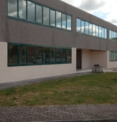 a building with a bench and a bench in front of it