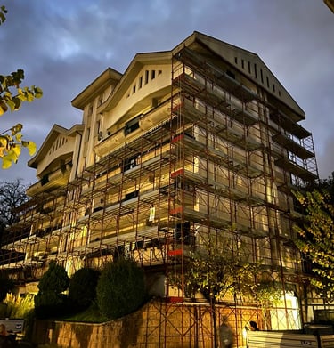 a building with scaffiered scaffolding on the side of it