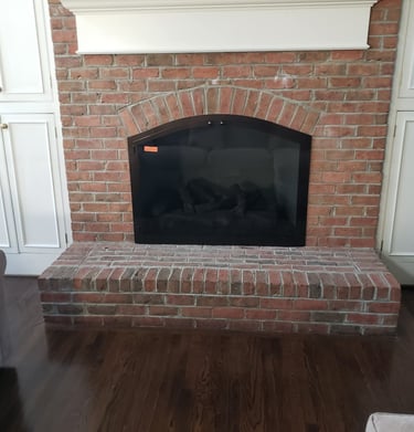 Fireplace and chimney restoration project completed in Waltham, MA by NE Chimney.