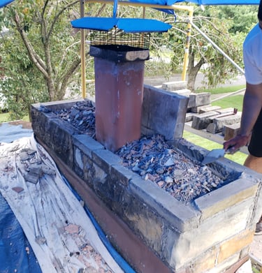 Professional chimney rebuilding project in Waltham, MA for a New England property.