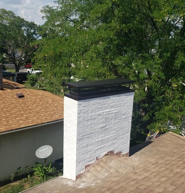 Residential chimney maintenance service in Waltham, MA by NE Chimney experts.