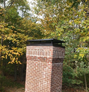Custom chimney cap installation in Waltham, MA completed by NE Chimney specialists