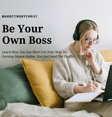 a woman sitting on a bed with a laptop and headphones studying to be her own boss