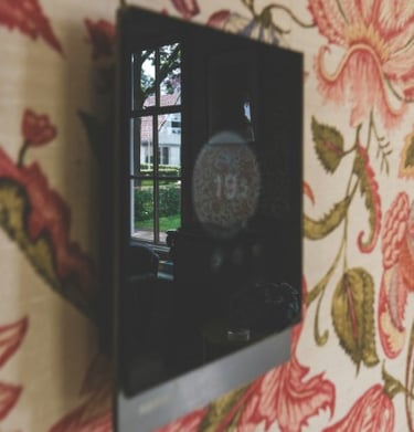 Moderne kamerthermostaat voor het regelen van de verwarming in een woning in regio Leuven en Tienen