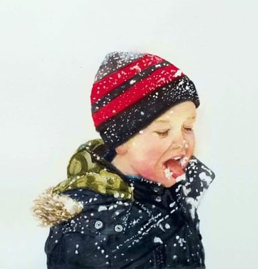 Little boy tasting falling snow flakes