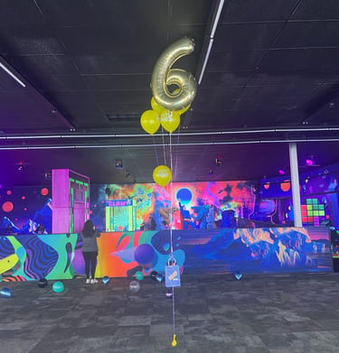 Children celebrating a birthday party in the arcade at Yum Yum Fun, Luzerne County