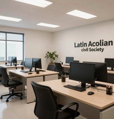 A professional interior photograph of a light-filled Latin American civil society organization office, featuring clean open-space desks and sleek technology.