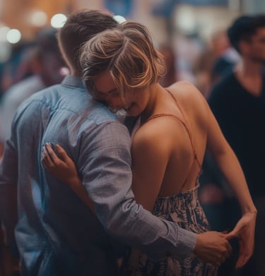 a man and woman dancing at a dance