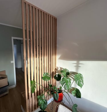 a planter with a plant in a room