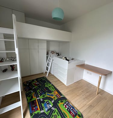 a room with a rug rug and a rug rug