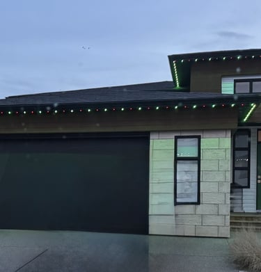 Suburban house with permanent outdoor lighting for holidays seasons