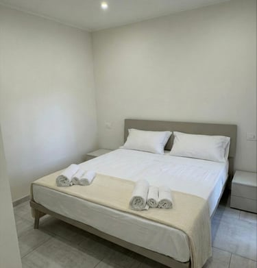 domus casa vacanze stanza da letto