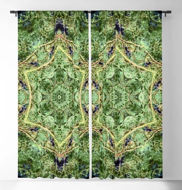 Pair of Black Out Curtains with a nature kaleidoscope design printed on them.