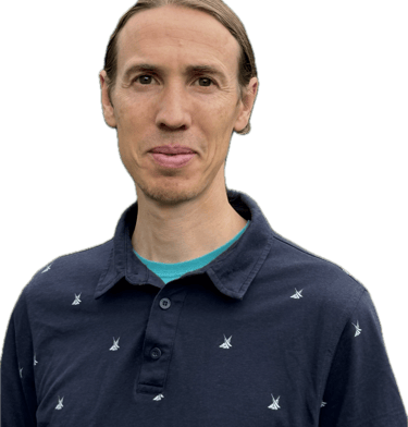 Image of Coach Chris looking at camera